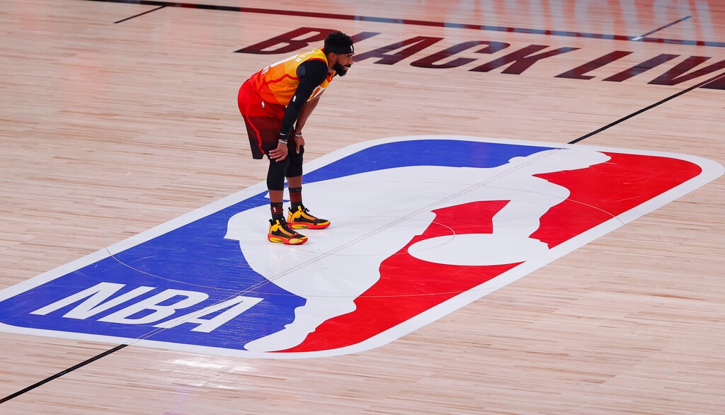(Mike Ehrmann | Pool via AP) Utah Jazz's Mike Conley looks on during the third quarter of Game 3 of an NBA basketball first-round playoff series against the Denver Nuggets, Friday, Aug. 21, 2020, in Lake Buena Vista, Fla.