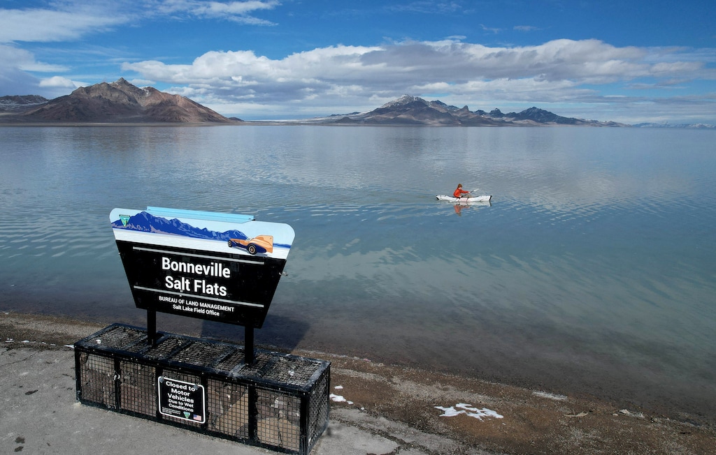 (Francisco Kjolseth | The Salt Lake Tribune) The Bonneville Salt Flats, comprised of mostly sodium chloride that forms a hard, white salt crust and home to numerous land speed records, are covered in nine inches of water, forming a shallow lake on Friday, Jan. 27, 2023. With nowhere for the rain and snow melt to go, precipitation slowly evaporates throughout the year to restore the flat's delicate salt layer.