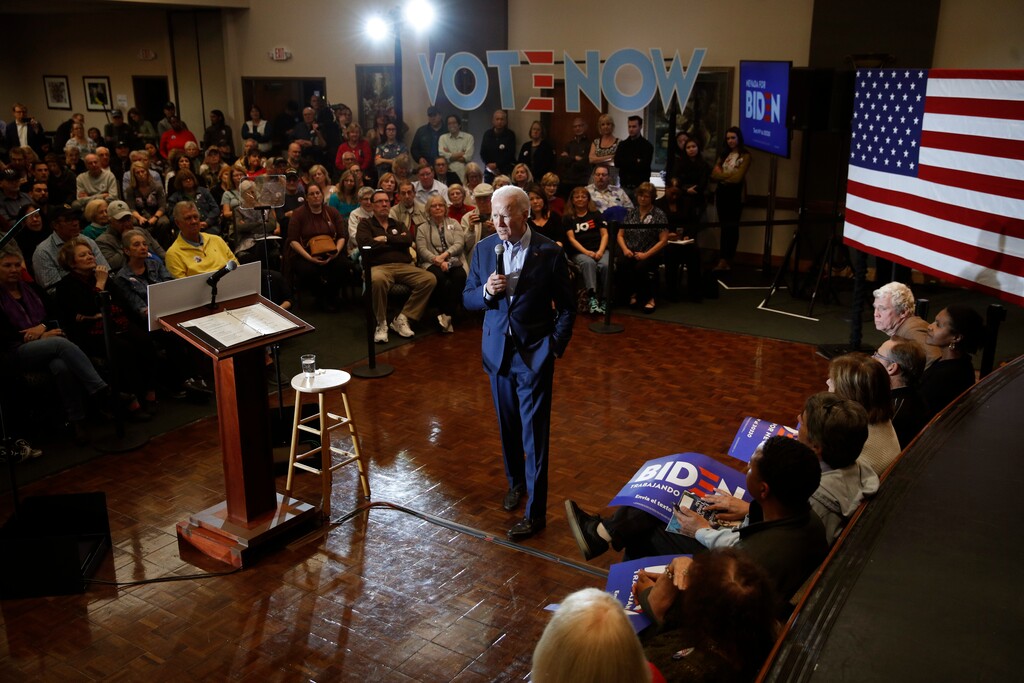 (John Locher | AP)  Democratic presidential candidate and former Vice President Joe Biden, center, speaks at a campaign event Friday, Feb. 14, 2020, in Henderson, Nev.