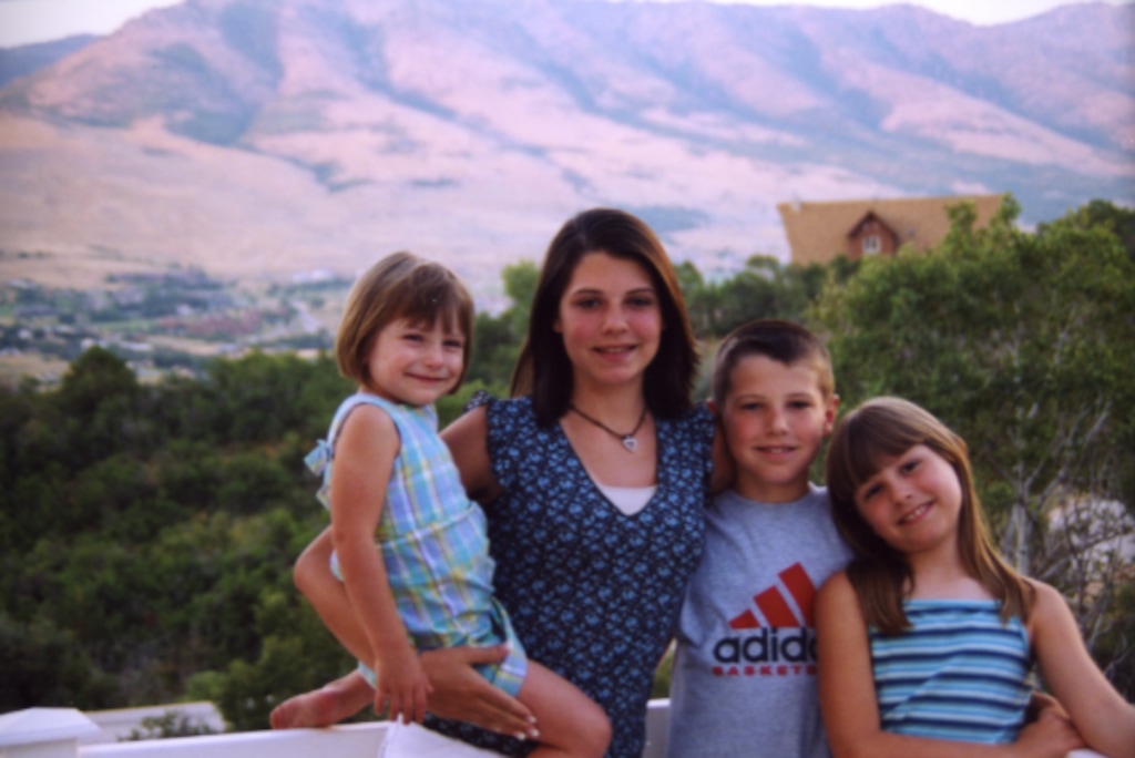 (Courtesy photo) The Staheli siblings — from left, Carly, Wesley, Logan and Maddie — take a photo together at their family's summer home in Eden, Utah.