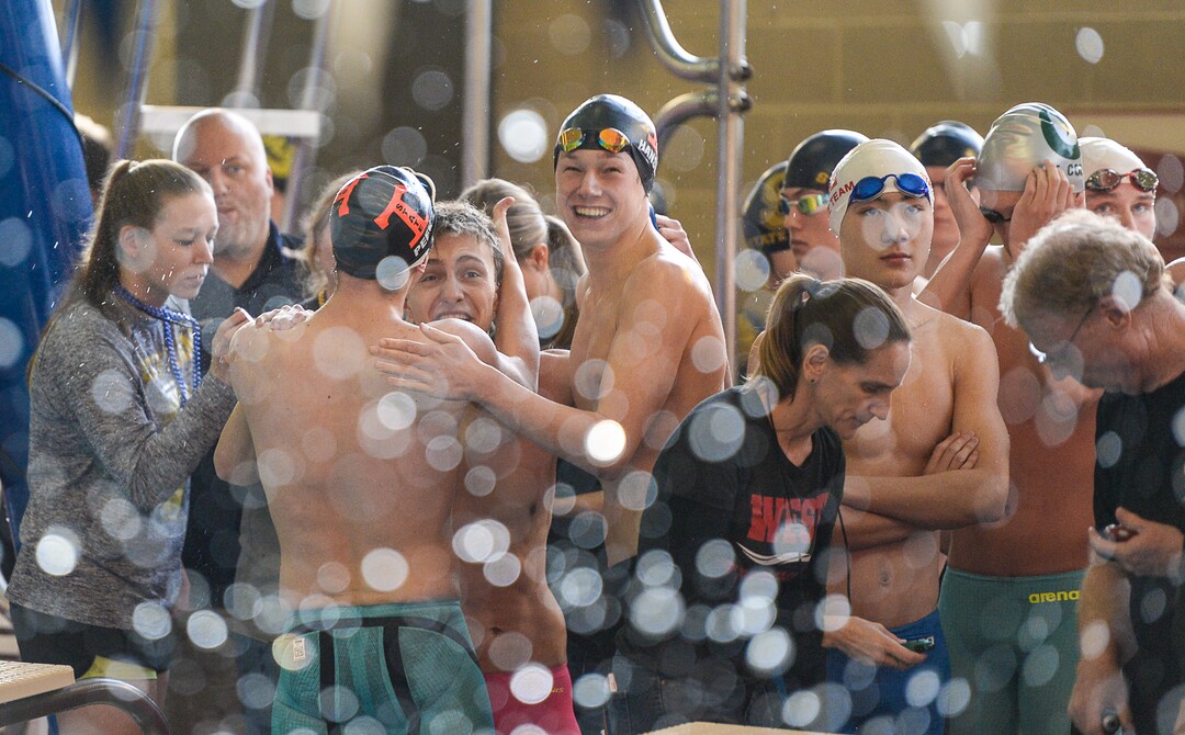 (Francisco Kjolseth  |  The Salt Lake Tribune)  Teams celebrate while competing in the Men 200 Yard Medley at the high school swimming 5A State Championships in Bountiful, Friday February 9, 2018.