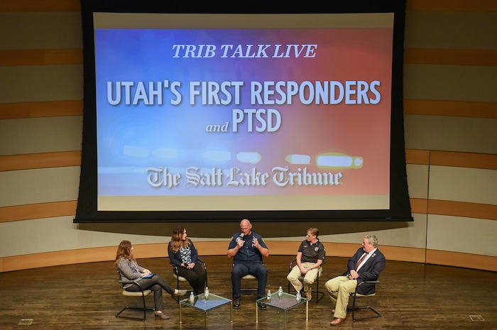 (Francisco Kjolseth | The Salt Lake Tribune) Tribune Editor Jennifer Napier-Pearce moderates a conversation with police officers and firefighters about mental health at the Salt Lake Public Library on Thursday, May 24, 2018. Panelists included Shante Johnson, spokesman for the Utah State Lodge Fop (Fraternal Order of Police) and the widow of Sgt. Derek Johnson, who was killed in the line of duty, Salt Lake City Fire Capt. Mike Stevens, an advocate for better mental health care for firefighters, Sgt. Lisa Pascadlo, peer-support coordinator at the Salt Lake City Police Department and Rep. Lee Perry, R-Perry, a Utah Highway Patrol lieutenant, who sponsored a new bill to provide confidentiality to first responders who talk to peer-support groups.