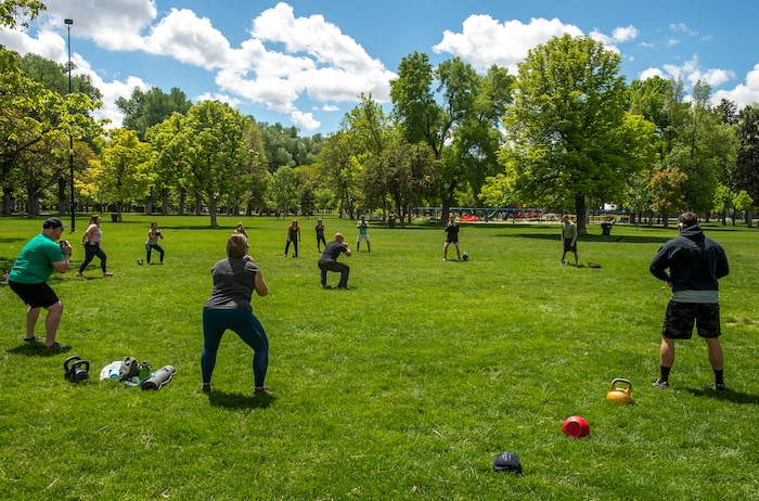 (Rick Egan  |  The Salt Lake Tribune)     Frank Young leads a fitness class at Liberty Park, Saturday, May 23, 2020.