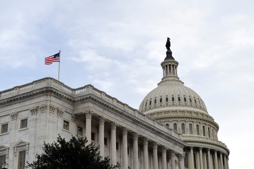 (Susan Walsh | AP file photo)  The flag flies outside the U.S. Capitol  Tuesday, Feb. 4, 2020.