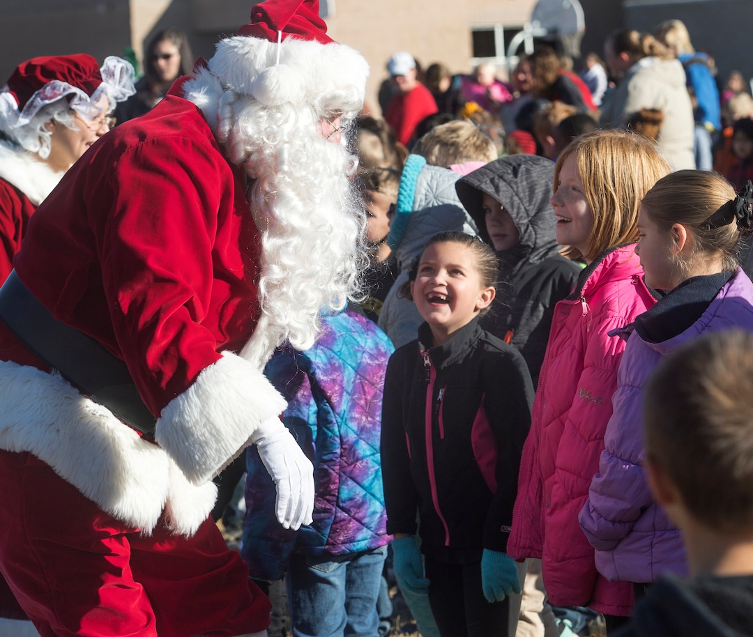 (Rick Egan  |  The Salt Lake Tribune) Santa and Mrs Claus greet students at Centennial Elementary School, in Roosevelt, Utah, as volunteer pilots from the Utah Wing of Angel Flight West,  brought school supplies and gifts to students in Roosevelt on their annual Santa Flight. Friday, December 8, 2017.