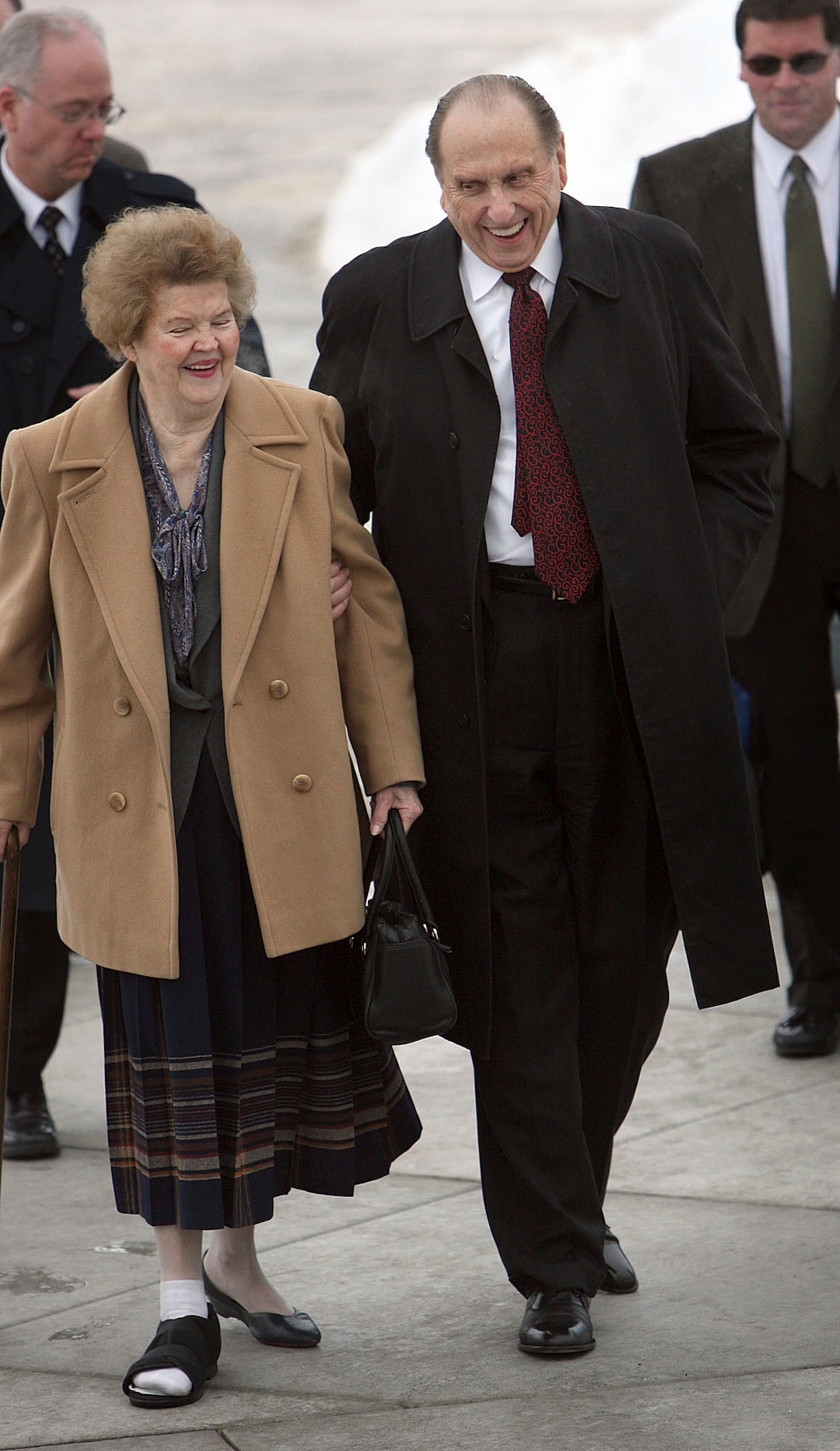 (Scott Sommerdorf  |  The Salt Lake Tribune) President Thomas S. Monson and his wife, Frances, stride up the walkway to the LDS temple in Rexburg, Idaho, on Feb. 10, 2008.