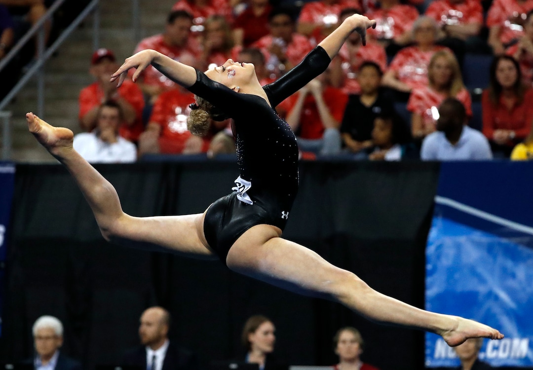 Utah's MaKenna Merrell competes on the floor exercise during the NCAA college women's gymnastics championships, Saturday, April 15, 2017, in St. Louis. (AP Photo/Jeff Roberson)