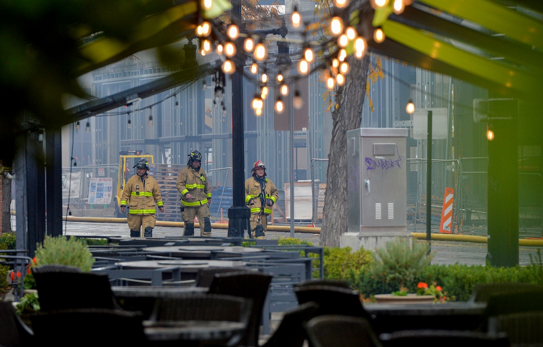 (Chris Samuels | The Salt Lake Tribune) Emergency crews continue to respond to a four-alarm fire in a new construction of apartment residences in Sugar House, Wednesday, Oct. 26, 2022.