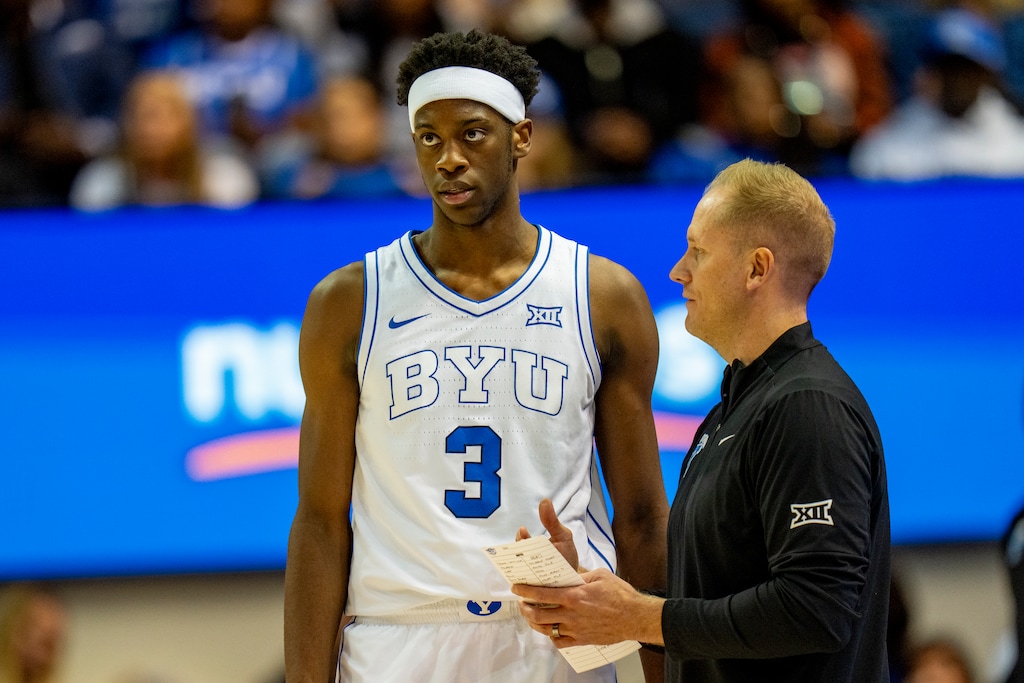 (Rick Egan | The Salt Lake Tribune) BYU Cougars head coach Kevin Young talks to forward AJ Dybantsa (3) during a break in the action, in basketball action between the BYU Cougars and the Holy Cross Crusaders at the Marriott Center in Provo, on Thursday, Nov. 8, 2025. 