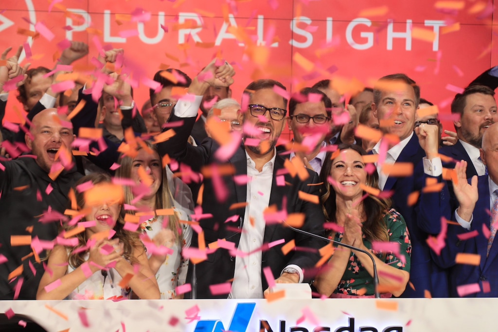 (Photo courtesy Pluralsight) Pluralsight CEO Aaron Skonnard and his team celebrate the company's IPO at The Nasdaq.