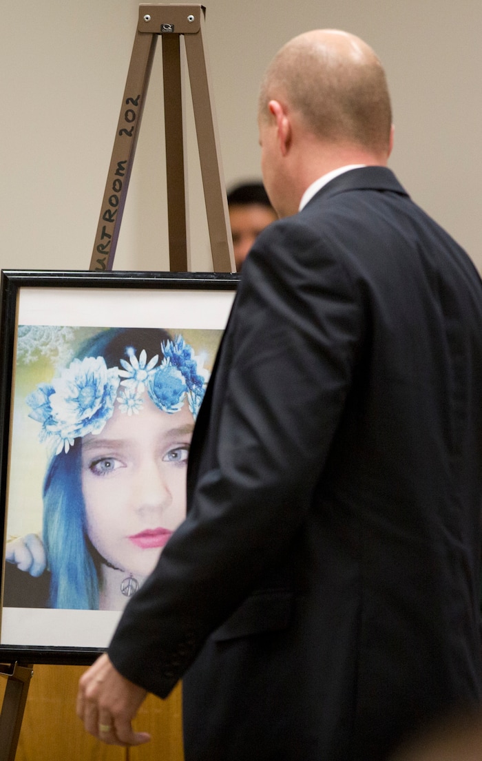 A photo of Jchandra Brown is placed on an easel by Chad Grunander, a prosecuting attorney, during the sentencing for Tyerell Przybycien in 4th District Court on Friday, Dec. 7, 2018, in Provo.