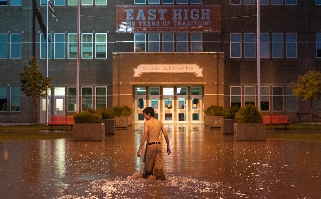 (Francisco Kjolseth | The Salt Lake Tribune) East High student Jack Atkinson, 15, who is starting 10th grade this fall checks out the flooding at his school following a torrential downpour on Sunday, Aug. 1, 2021.