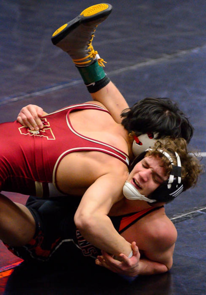 (Trent Nelson | The Salt Lake Tribune)  Viewmont's Shion Abe and Murray's David Keorte (bottom), 5A State Championships, high school wrestling quarterfinals in Orem, Wednesday February 7, 2018.