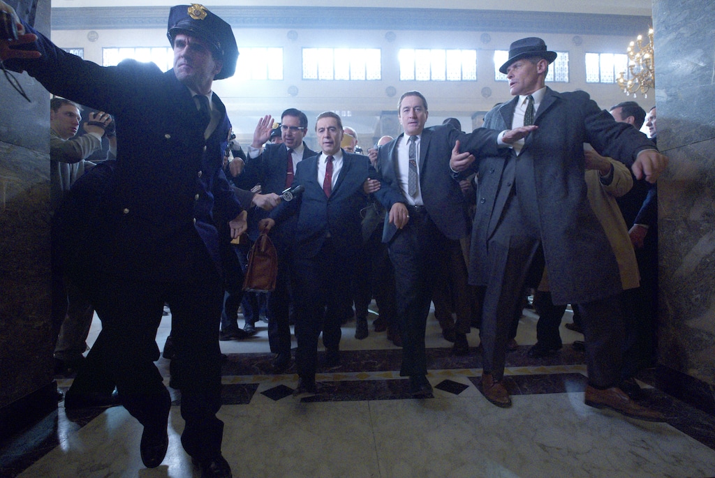 (Photo courtesy of Netflix)  Al Pacino, center left, plays Teamsters boss Jimmy Hoffa, and Robert De Niro, center right, plays mob fixer Frank Sheeran, in a scene from Martin Scorsese's "The Irishman."