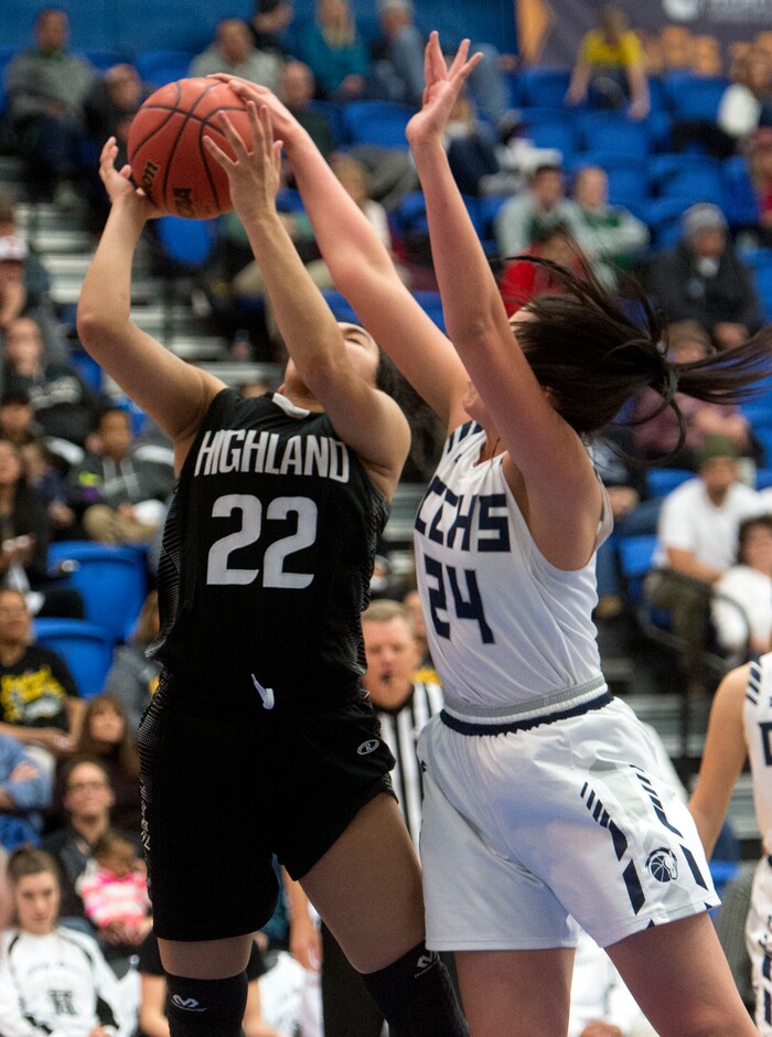 (Rick Egan | The Salt Lake Tribune) Highand High Rams Kaija Glasker (22) shoots as Corner Canyon Chargers Angela Vaifanua (24) defends, in Class 5A women's basketball playoff game between Corner Canyon and Highland, Monday, Feb. 19, 2018.