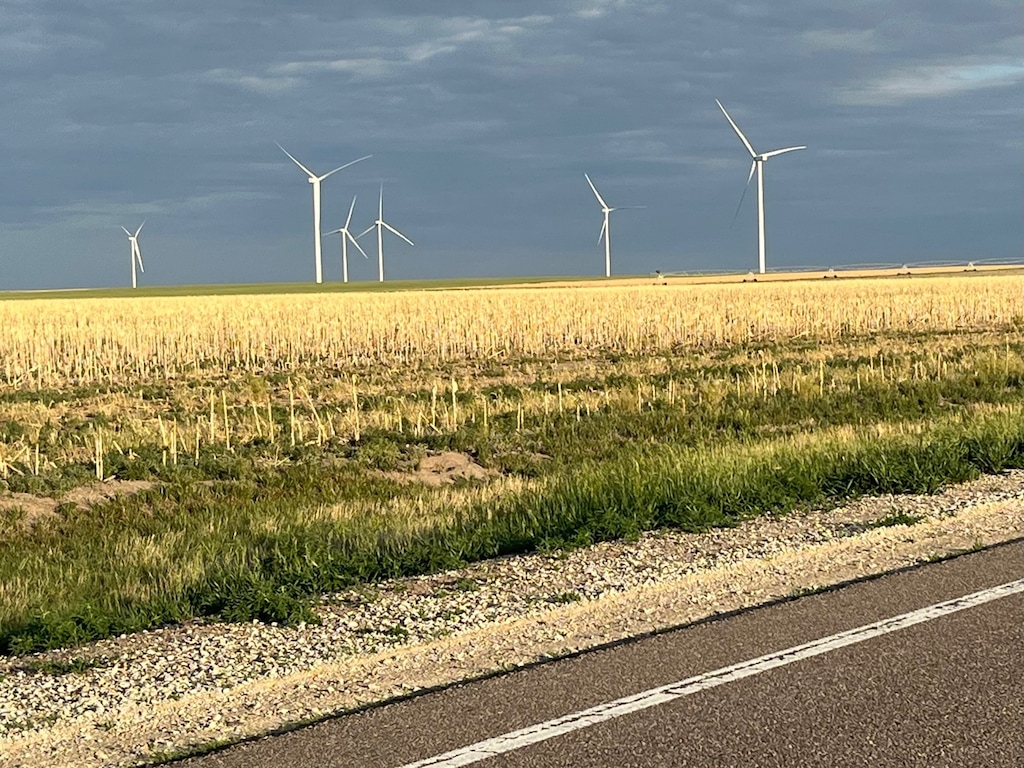 (Dave Marston | Writers on the Range)

Clouds over a windmill farm outside Oakley, Kansas,