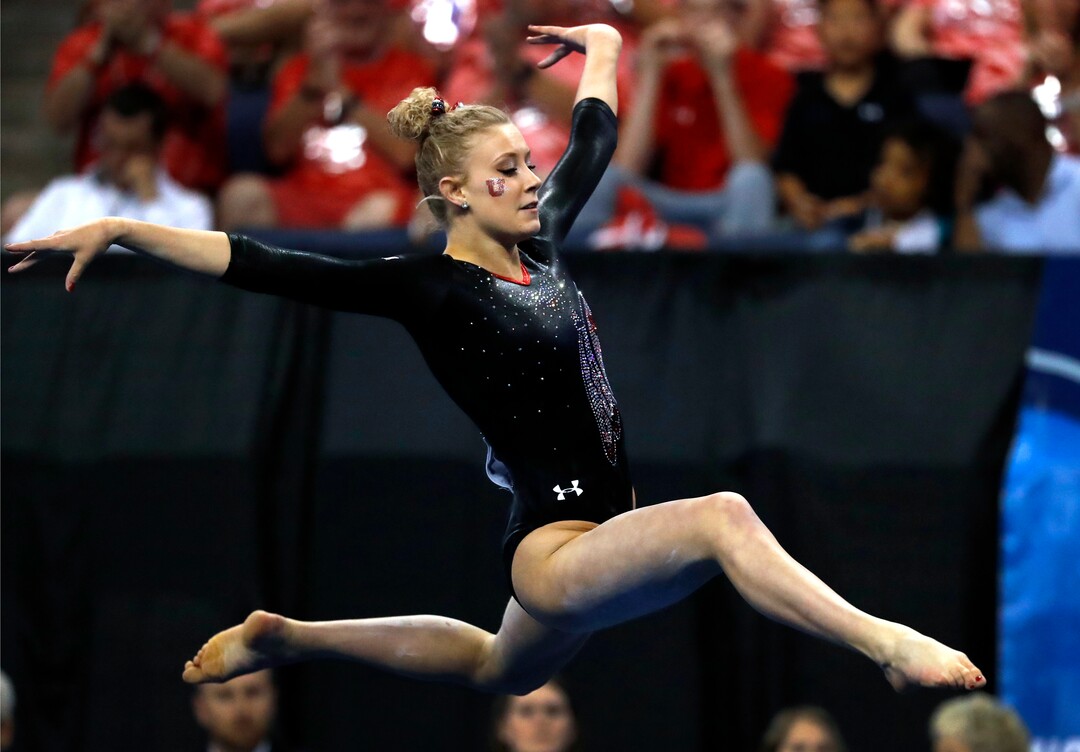 Utah's MaKenna Merrell competes on the floor exercise during the NCAA college women's gymnastics championships, Saturday, April 15, 2017, in St. Louis. (AP Photo/Jeff Roberson)