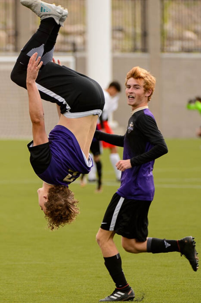 (Trent Nelson | The Salt Lake Tribune)  Desert Hills vs. Park City High School, Saturday May 12, 2018. Desert Hills's Kelton Holt celebrates a goal with a cartwheel and backflip.