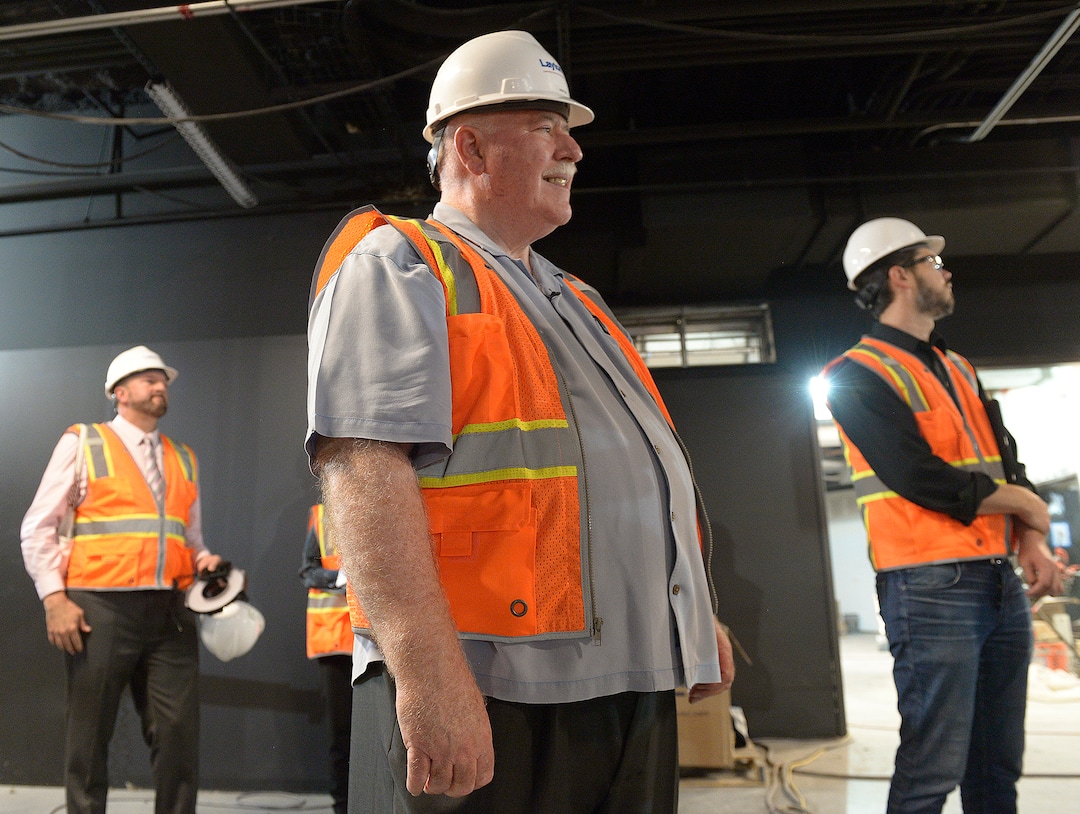 (Leah Hogsten  |  The Salt Lake Tribune) Sandy City Mayor Tom Dolan watches a demonstration of the hydraulics of the new one-of-a-kind Hale Centre Theatre stage, designed by TAIT Towers, based on technology from rock concert tours and Cirque theaters in Las Vegas. The Mountain American Performing Arts Centre is the new 130,000 square feet home to new Hale Centre Theatre, August 8, 2017. 