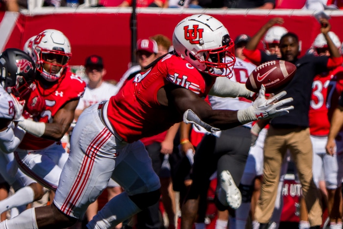 (Trent Nelson  |  The Salt Lake Tribune) Utah Utes linebacker Devin Lloyd (0) pulls in an interception as the University of Utah hosts Washington State, NCAA football in Salt Lake City on Saturday, Sept. 25, 2021.