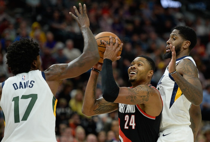 (Francisco Kjolseth  |  The Salt Lake Tribune)  Portland Trail Blazers guard Kent Bazemore (24) is pressured by the Jazz as the Utah Jazz host the Portland Trailblazers in their NBA basketball game at Vivint Smart Home Arena in Salt Lake City on Wed. Oct. 16, 2019.