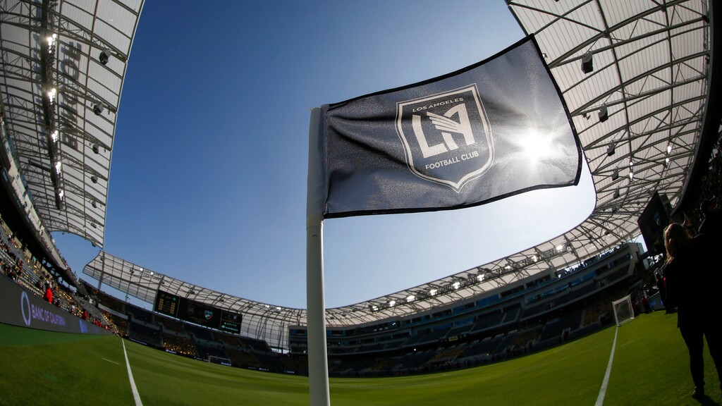 (Ringo H.W. Chiu | AP) In this April 29, 2018 file photo, a flag flies at the Banc of California Stadium prior to an MLS soccer game between Los Angeles FC and the Seattle Sounders in Los Angeles.