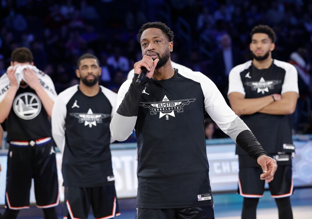 (Chuck Burton | AP) Team LeBron's Dwayne Wade, of the Miami Heat, speaks during the second half of an NBA All-Star basketball game, Sunday, Feb. 17, 2019, in Charlotte, N.C.