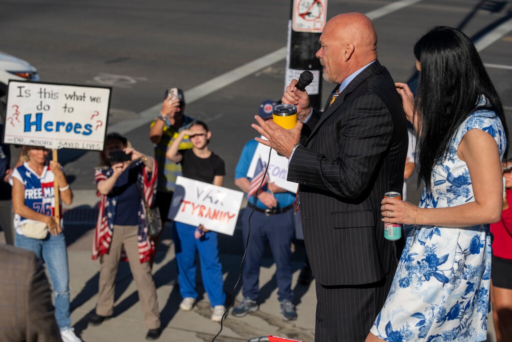 (Rick Egan | The Salt Lake Tribune) Kirk Moore says a few words to his supporters at a rally on the steps of the Orrin G. Hatch Federal Courthouse in Salt Lake City on Monday, July 7, 2025. Moore is accused of fraudulently distributing COVID-19 vaccination cards.