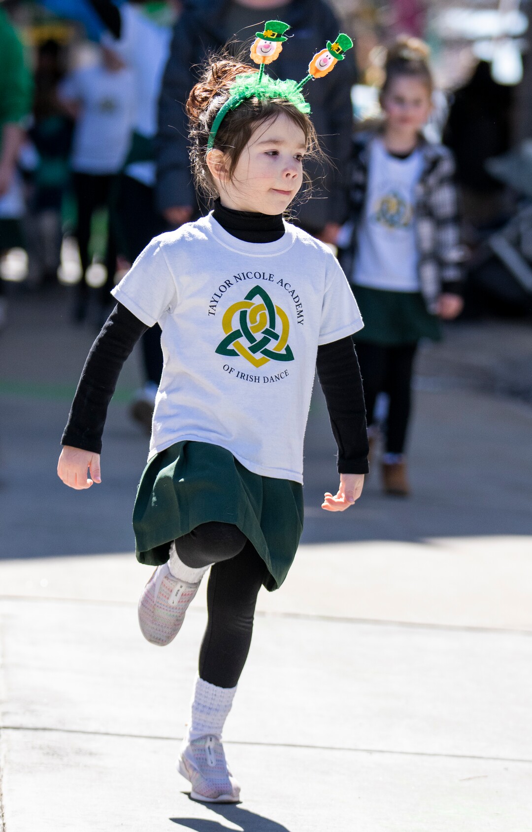 (Rick Egan | The Salt Lake Tribune) Faye Roberts, 4, dances with the Taylor Nicole Academy of Irish Dance, in the St. Patrick's Parade, in Salt Lake City, on Saturday, March 12, 2022.