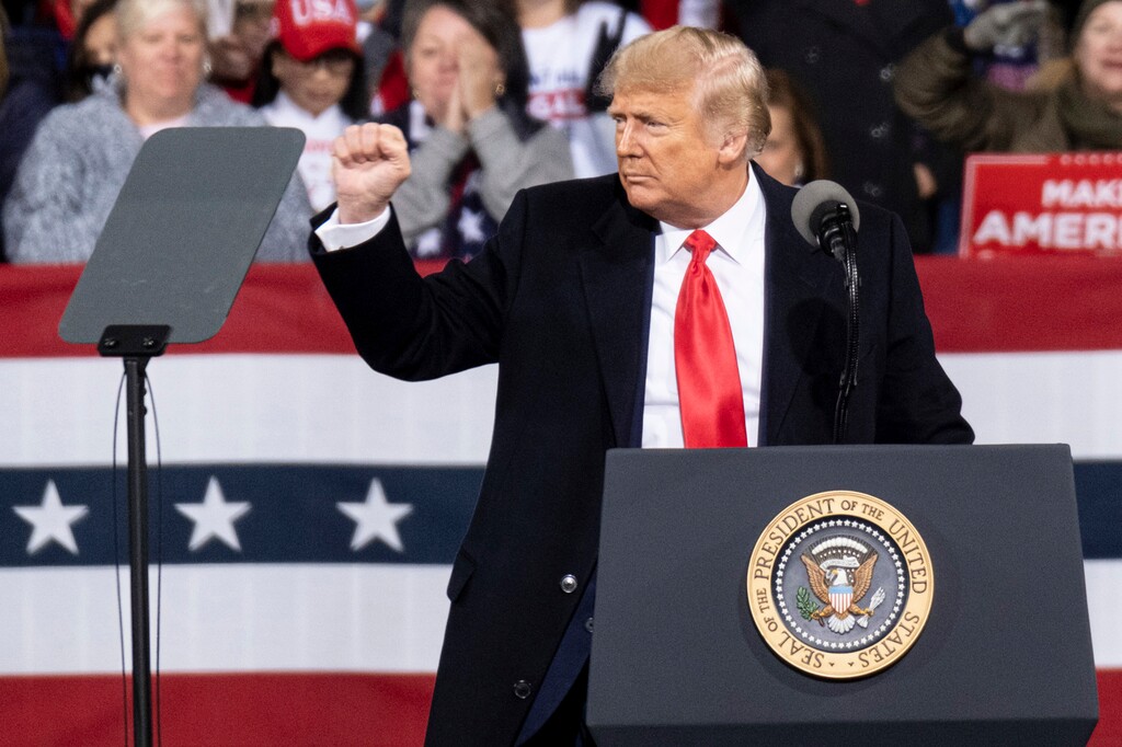President Donald Trump addresses the crowd at a rally for U.S. Senators Kelly Loeffler, R-Ga., and David Perdue, R-Ga., who are both facing runoff elections Saturday, Dec. 5, 2020, in Valdosta, Ga. (AP Photo/Ben Gray)