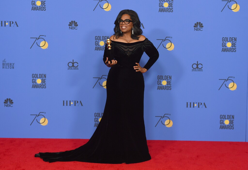 (Jordan Strauss | Invision | The Associated Press) Oprah Winfrey poses in the press room with the Cecil B. DeMille Award at the 75th annual Golden Globe Awards at the Beverly Hilton Hotel on Sunday, Jan. 7, 2018, in Beverly Hills, Calif.