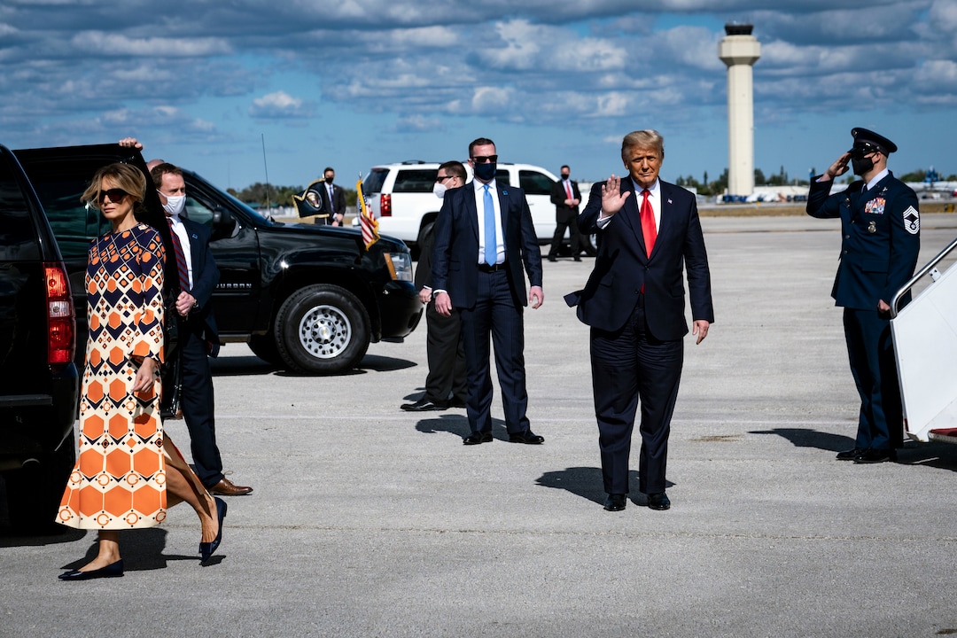 Outgoing President Donald Trump and first lady Melania Trump are greeted by supporters as they arrive at Palm Beach International Airport in West Palm Beach, Fla., on Inauguration Day, Wednesday, Jan. 20, 2021. (Pete Marovich/The New York Times)