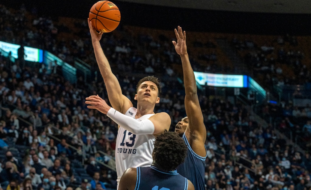 Rick Egan | The Salt Lake Tribune)  Brigham Young guard Alex Barcello (13) scores for the Cougars, in WCC basketball action between the Brigham Young Cougars and the San Diego Toreros, at the Marriott Center, on Thursday, January 20, 2022.