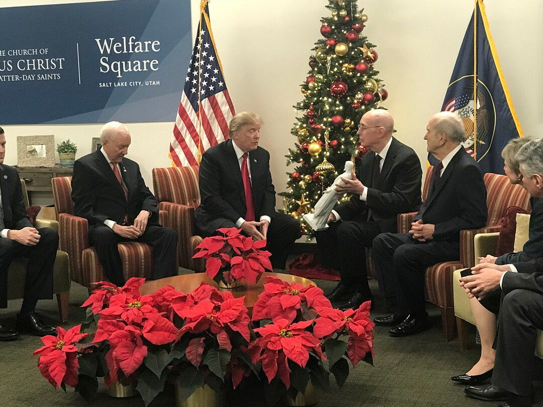 (Courtesy of LDS Church)  President Henry B. Eyring of the First Presidency gives U.S. President Donald J. Trump a Christus statue during a visit to Welfare Square in Salt Lake City, December 4, 2017. 