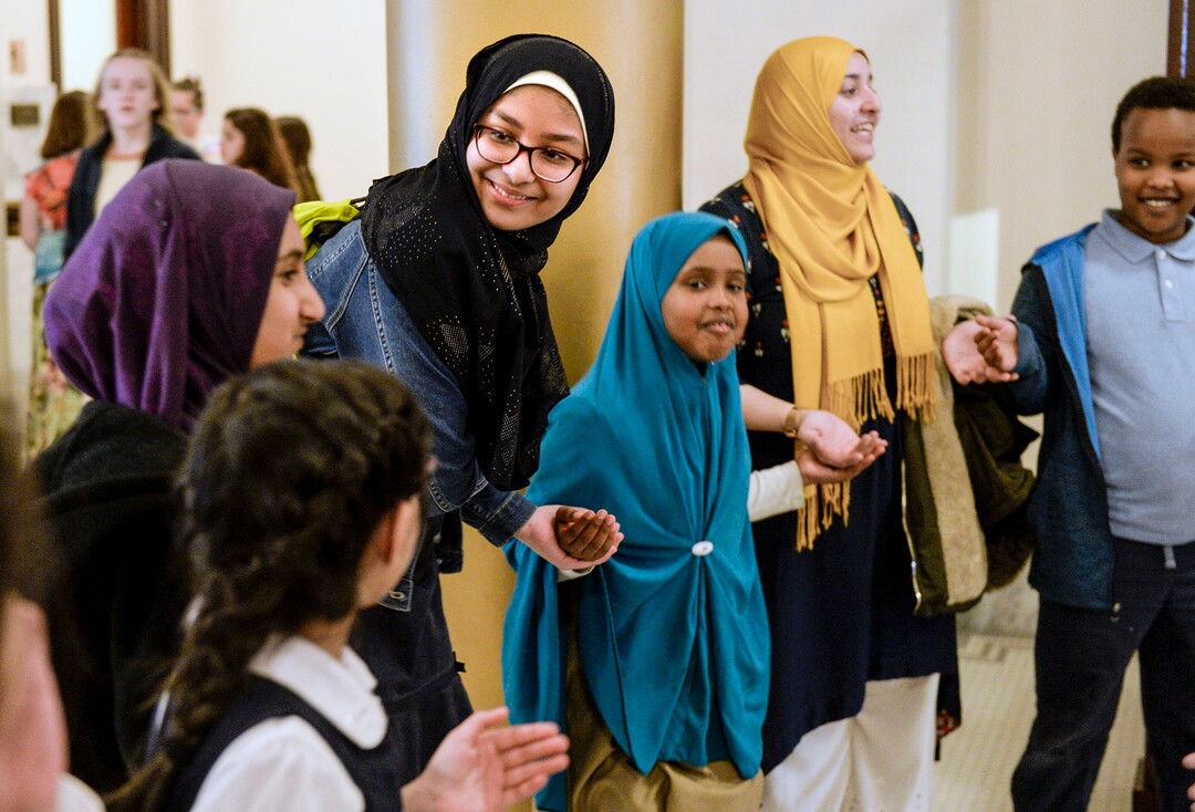 (Leah Hogsten  |  The Salt Lake Tribune)  Students from Iqra Academy of Utah share a laugh during the Utah Muslim Civic League inaugural Muslim Day on the Hill, Feb. 25, 2020 at the Capitol.