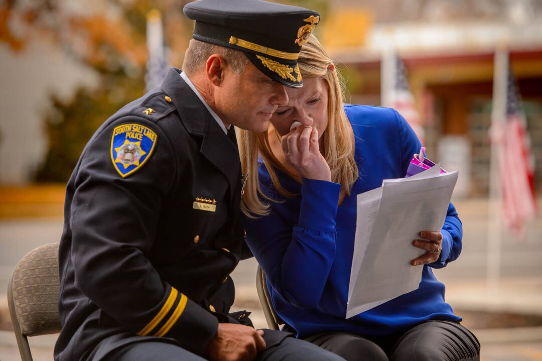 (Trent Nelson  |  The Salt Lake Tribune) South Salt Lake Police Deputy Chief Dwayne Ruth comforts Jennifer Romrell Legerski, Officer Romrell's sister, after she spoke at the dedication ceremony of the David P. Romrell Public Safety Building on Sunday Nov. 24, 2019. The building is named after Officer Romrell, who was killed in the line of duty on Nov. 24, 2018 - one year ago.