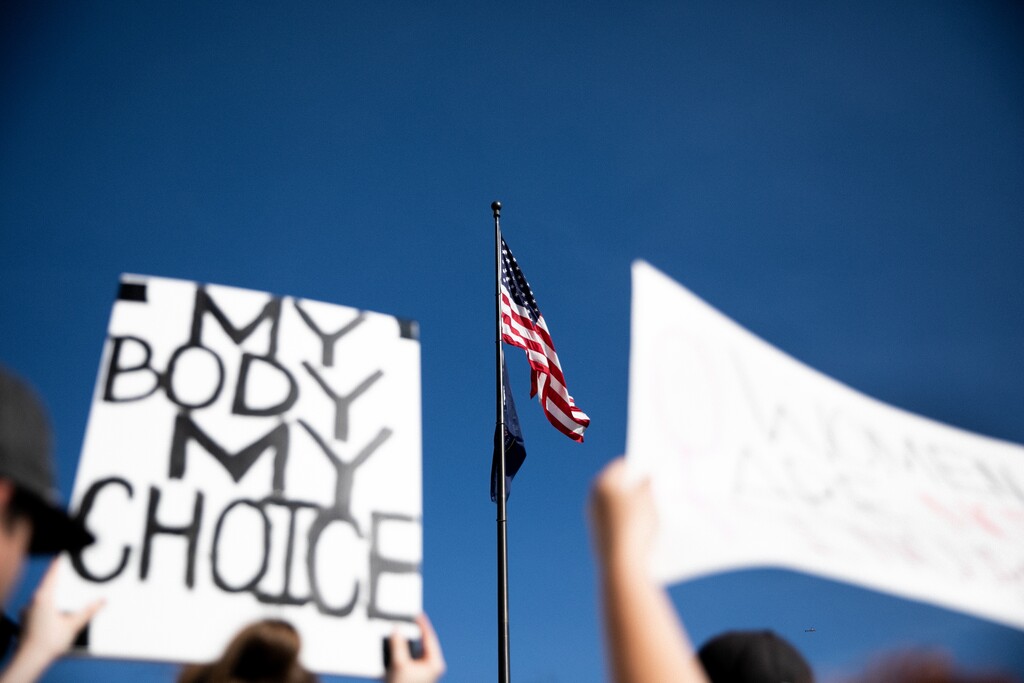 (Rachel Rydalch | Special to The Tribune) Izzy Milligan holds up a sign that reads "My body my choice" at a rally in support of abortion rights on Sunday, June 26, 2022. Reproductive rights may be subject to a number of changes in the Beehive State as its trigger law is challenged in court and lawmakers open abortion-related bill files for the next legislative session.