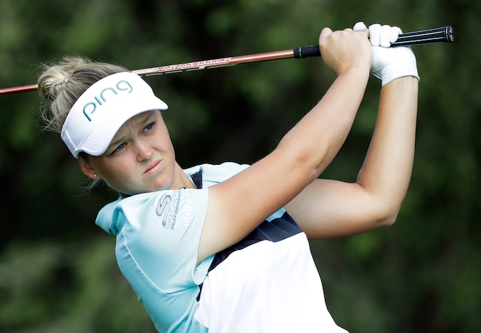 Brooke Henderson, of Canada, watches her tee shot on the fourth hole during the final round of the Indy Women in Tech Championship golf tournament, Saturday, Sept. 9, 2017, in Indianapolis. (AP Photo/Darron Cummings)