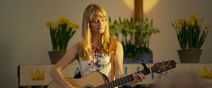 (photo courtesy Freestyle Releasing) Amber (Lindsay Pulsipher) prepares to sing in church for the first time in years, in the drama "God Bless the Broken Road."
