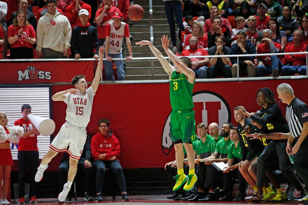 (AP file photo) Oregon guard Payton Pritchard (3) shoots a 3-pointer as Utah guard Rylan Jones (15) defends in the second half during an NCAA college basketball game Saturday, Jan. 4, 2020, in Salt Lake City.