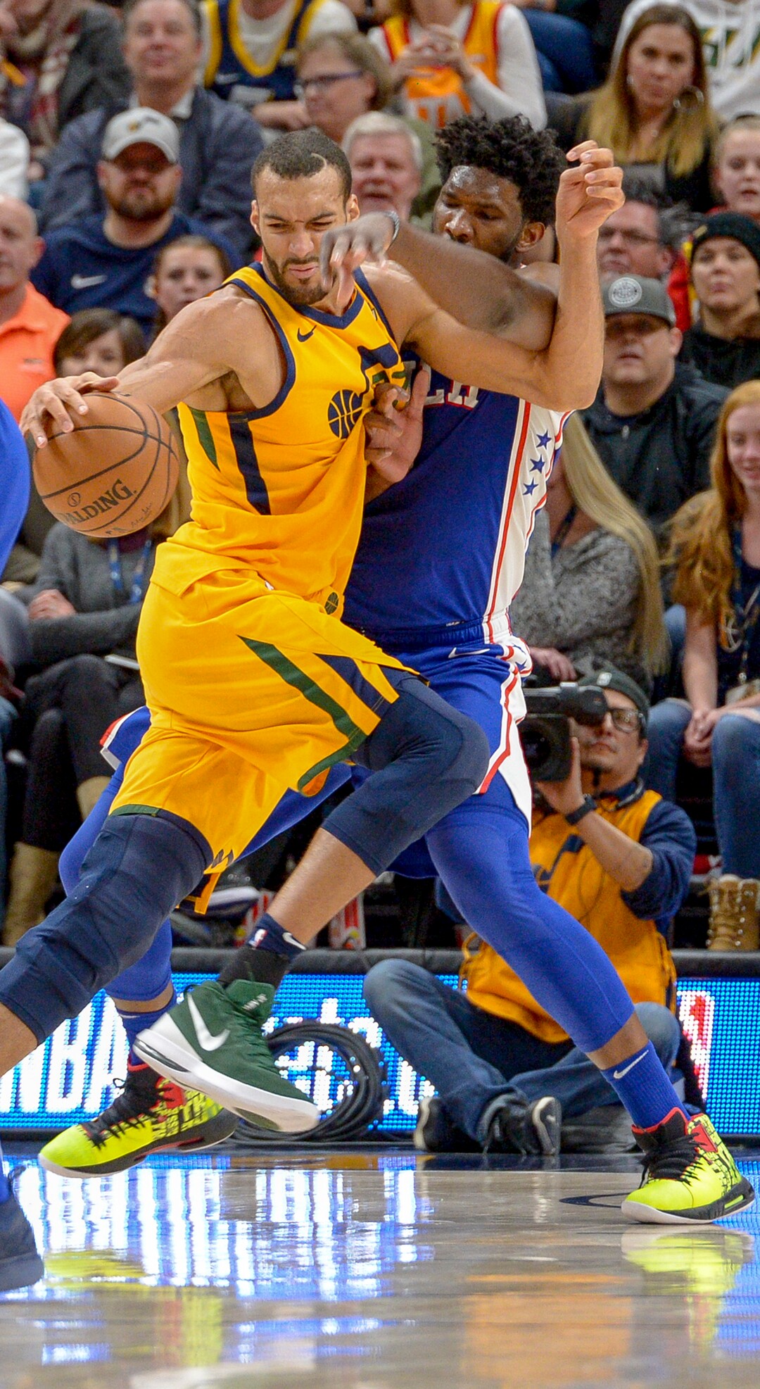 Leah Hogsten  |  The Salt Lake Tribune  Utah Jazz center Rudy Gobert (27) battles Philadelphia 76ers center Joel Embiid (21). The Philadelphia 76ers defeated the Utah Jazz 114- 97 at Vivint Smart Home Arena, Thursday, December 27, 2018. 