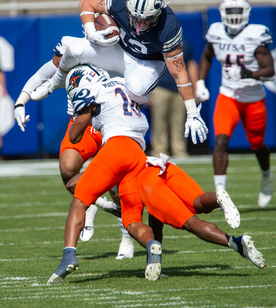 (Rick Egan  |  The Salt Lake Tribune)    Brigham Young Cougars tight end Masen Wake (13) leaps over the top of UTSA Roadrunners cornerback Corey Mayfield Jr. (26) in football action between the Brigham Young Cougars and the UTSA Roadrunners, at Lavell Edwards stadium, Saturday, Oct. 10, 2020.
