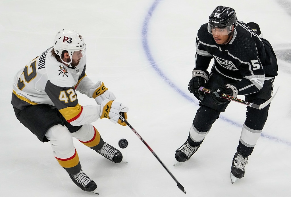 (Leah Hogsten | The Salt Lake Tribune)
Vegas Golden Knights defenseman Daniil Miormanov, left, and Los Angeles Kings center Quinton Byfield fight for possession of the puck during a preseason game at Vivint Arena on Sept. 30, 2021. Utah Jazz owner Ryan Smith has reportedly met with NHL commissioner Gary Bettman to discuss NHL possibilities for Utah.