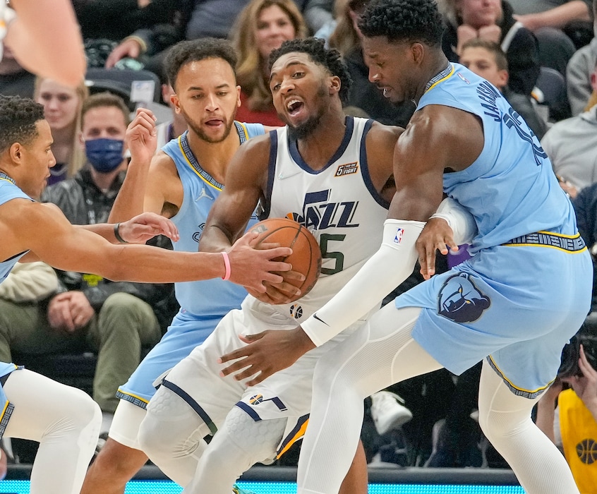 (Leah Hogsten | The Salt Lake Tribune) Utah Jazz guard Donovan Mitchell (45) is pressured by Memphis Grizzlies guard Desmond Bane (22), Memphis Grizzlies forward Kyle Anderson (1) and Memphis Grizzlies forward Jaren Jackson Jr. (13) as the Utah Jazz host the Memphis Grizzlies,  Nov. 22, 2021 at Viviant Arena. 
