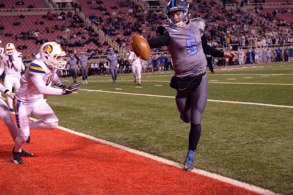 (Leah Hogsten | The Salt Lake Tribune) Sky View quarterback Jackson Siddoway runs in a touchdown in the second half. Orem High School defeated Sky View High School 28-12 during their class 4A state semifinal game at Rice-Eccles Stadium, Friday, Nov. 10, 2017.