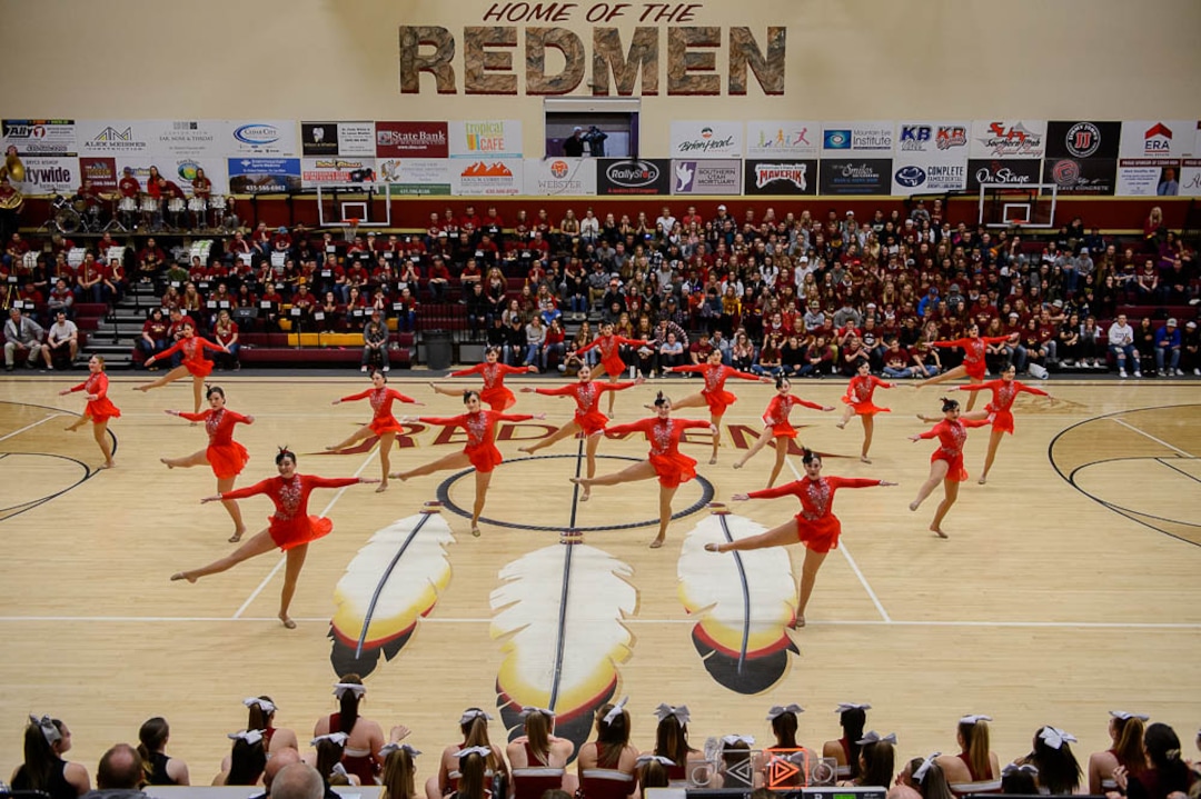 (Trent Nelson | The Salt Lake Tribune)  Cedar High School is considering a change in the name of its mascot, The Redmen, Friday Jan. 11, 2019. Mohey Tawa, the Cedar High drill team, performs at halftime of a basketball game vs. Canyon View.