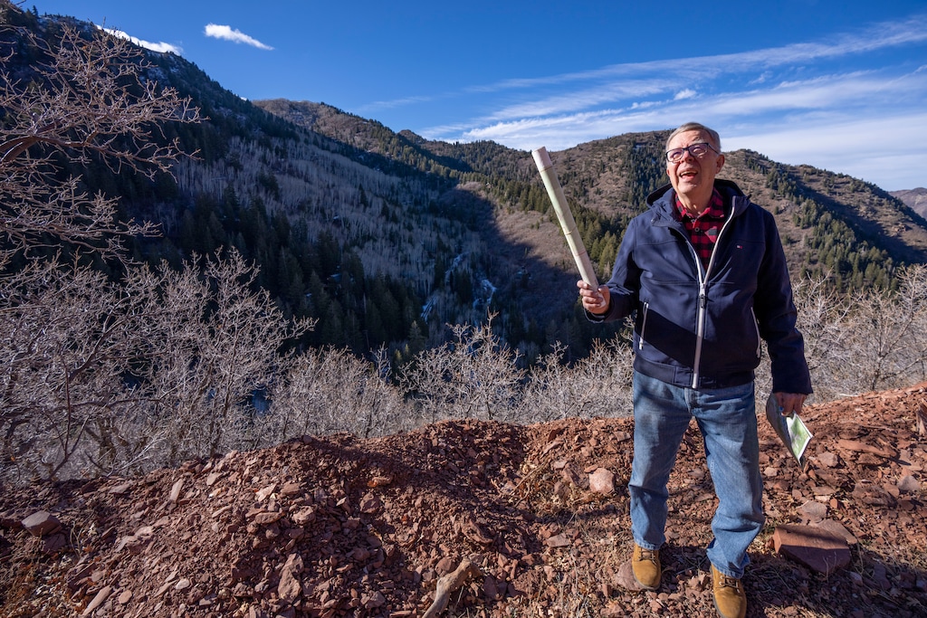(Rick Egan | The Salt Lake Tribune)  Mt. Aire Canyon homeowner Joe Reimann, points out some of the areas that may be affected by the proposed open-pit limestone quarry, in Parleys Canyon, on Wednesday, December 8, 2021.