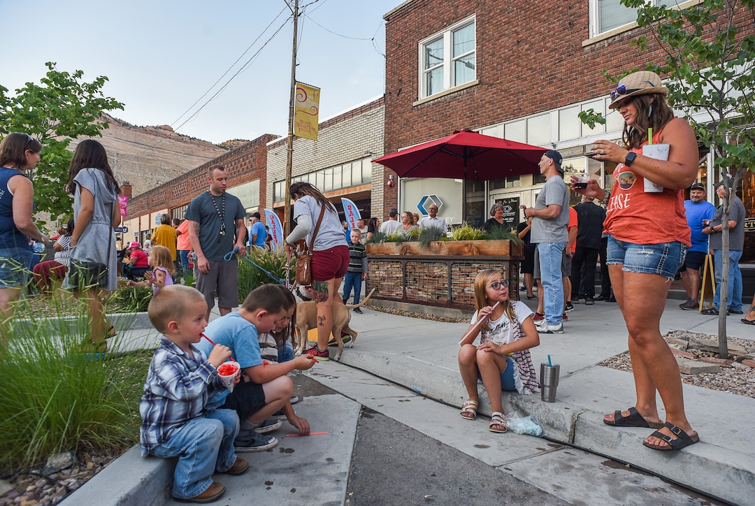 (Francisco Kjolseth  |  The Salt Lake Tribune)  Helper First Fridays draws people to historic Main Street on Friday, Aug. 2, 2019, for their monthly gallery stroll where the small town has been discovered by a variety of artists and dreamers seeking to escape the hustle of the Wasatch Front, lured by cheap real estate prices. Helper today resembles Park City in the late 1960s. Some aging, empty buildings remain, but newcomers joining natives are slowly reinventing the little town of just over 2,000 residents as an artist colony and tourist destination.