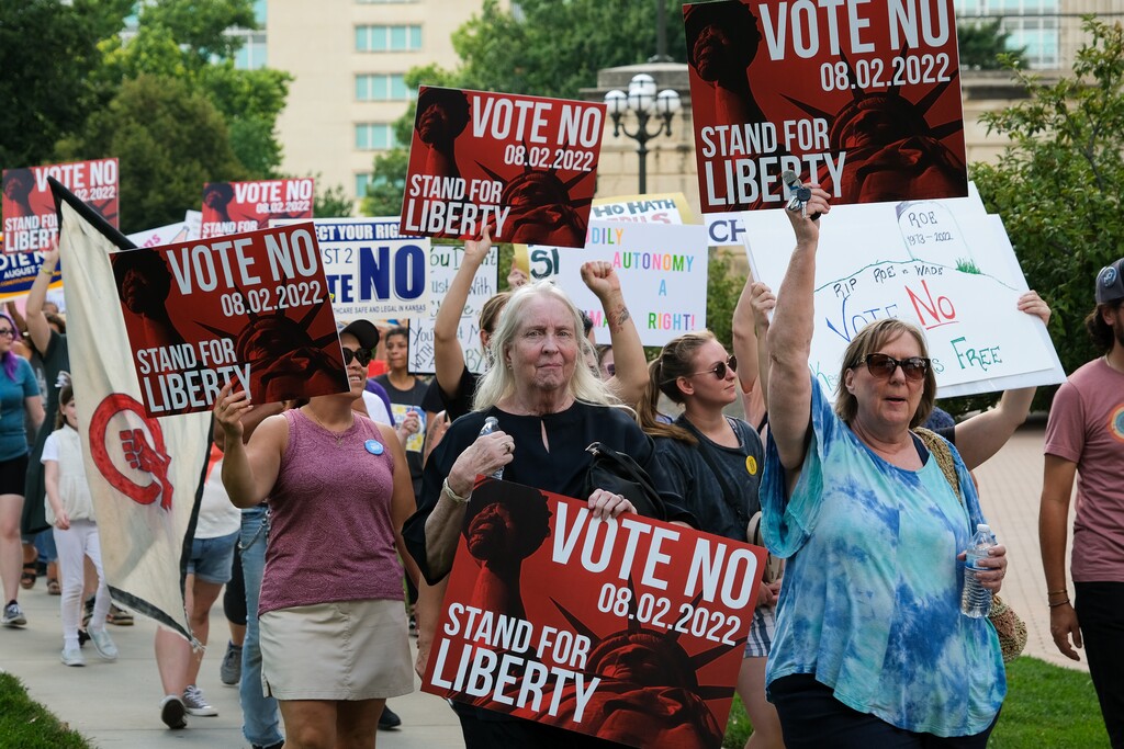 (Arin Yoon | The New York Times)

Abortion rights demonstrators in Topeka, Kan., July, 30, 2022. After a broad victory in a deep-red state, Democrats are vowing to elevate the fight over abortion rights in midterm races across the country.