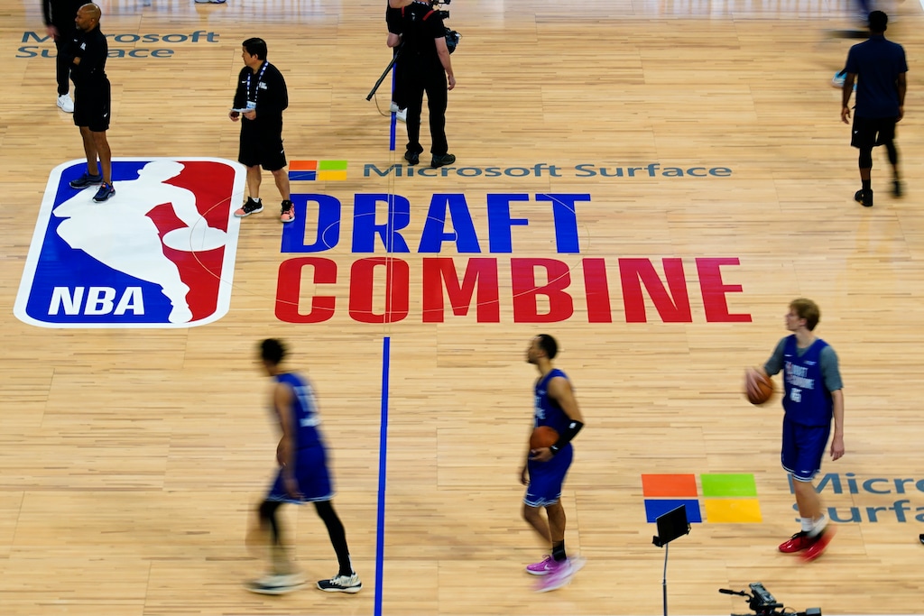 (Nam Y. Huh  |  The Associated Press) Participants walk on the court during the 2023 NBA Draft Combine in Chicago.